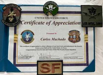 Certificate of Appreciation presented to Carlos Machado